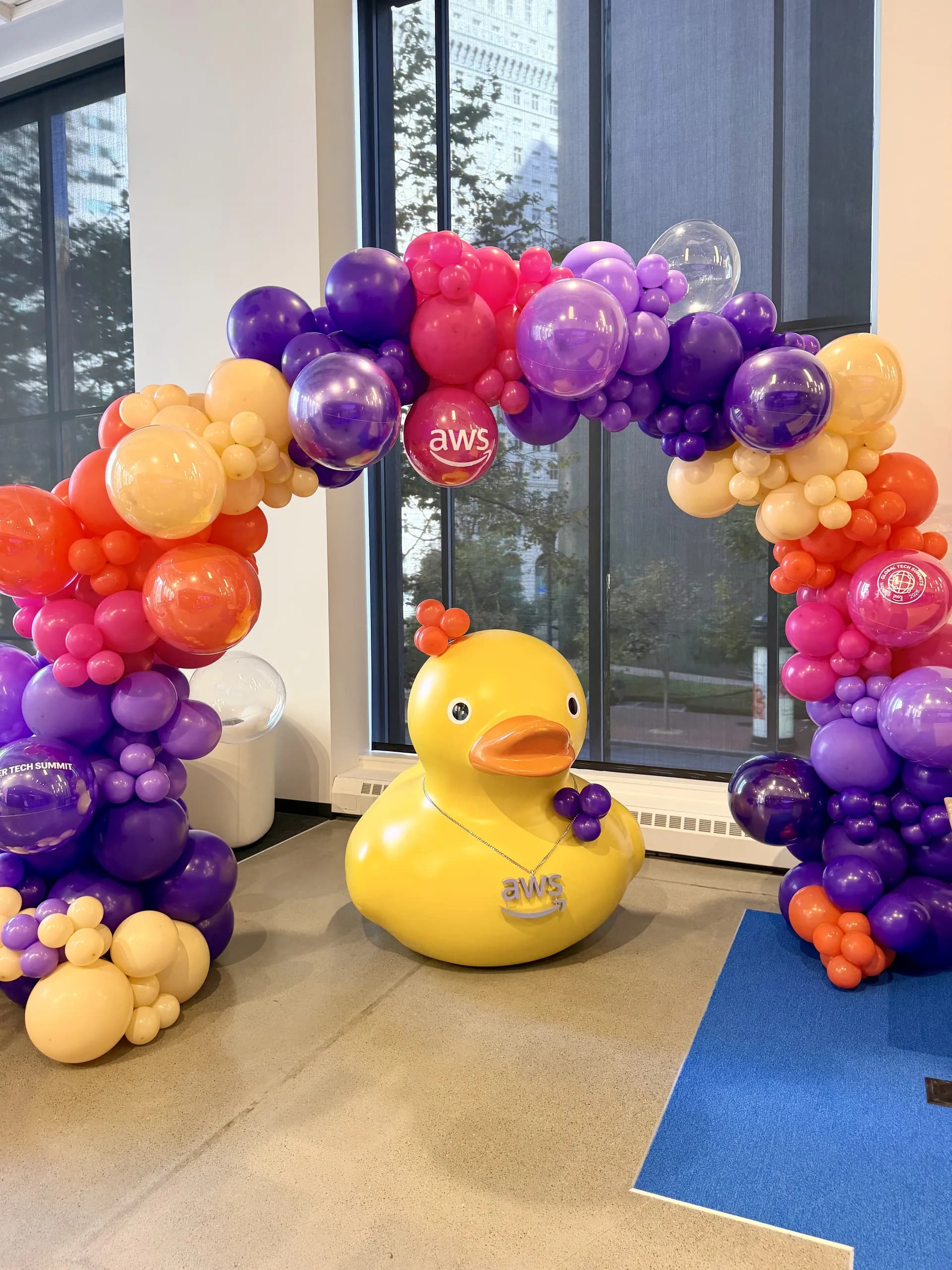 AWS's Tech Summit 2026 in San Francisco, California: two statement balloon arches and a branded photo zone, view 2 of 8.