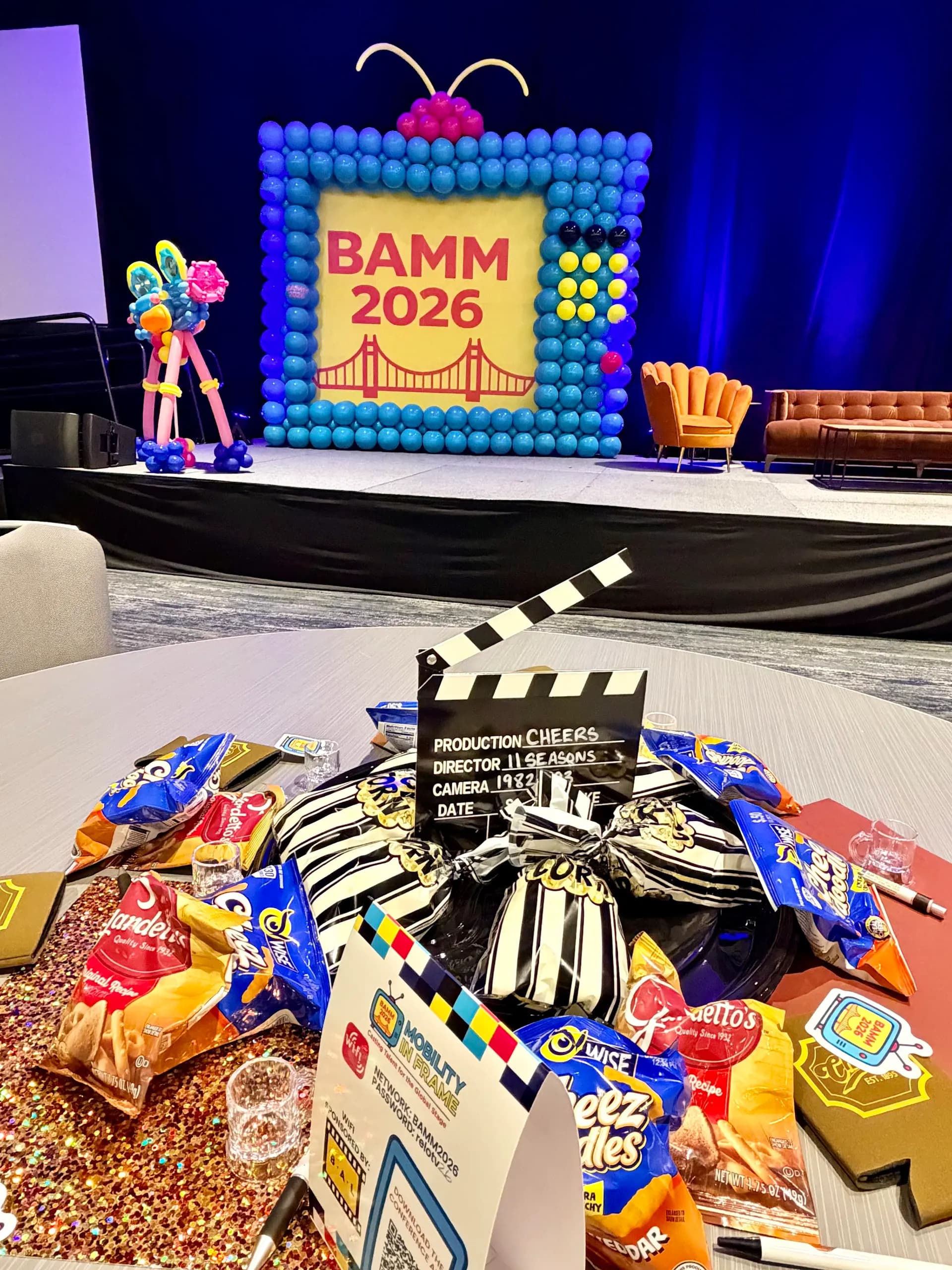 Large-scale corporate balloon installation in event brand colours at the BAMM conference, Hyatt Regency San Francisco Airport.