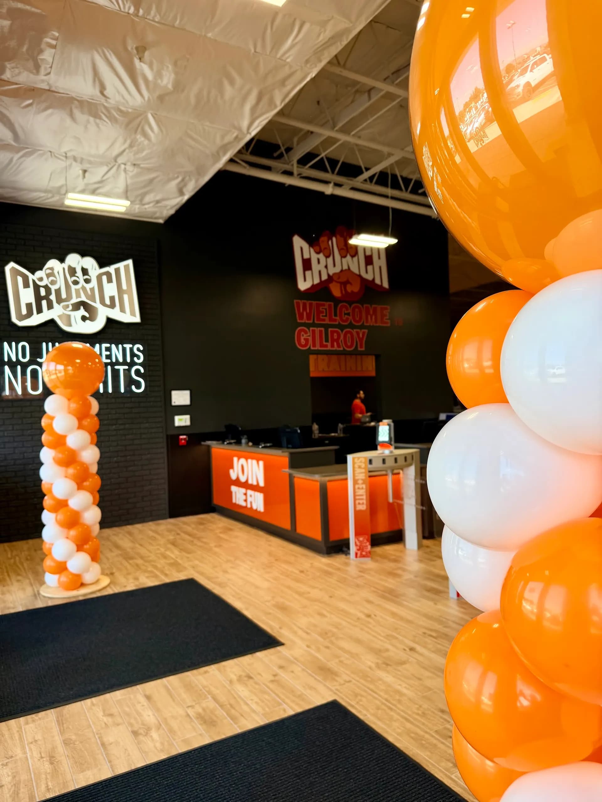 Crunch Fitness' Gym Grand Opening in Gilroy, California: balloon arch and entrance columns, view 2 of 3.