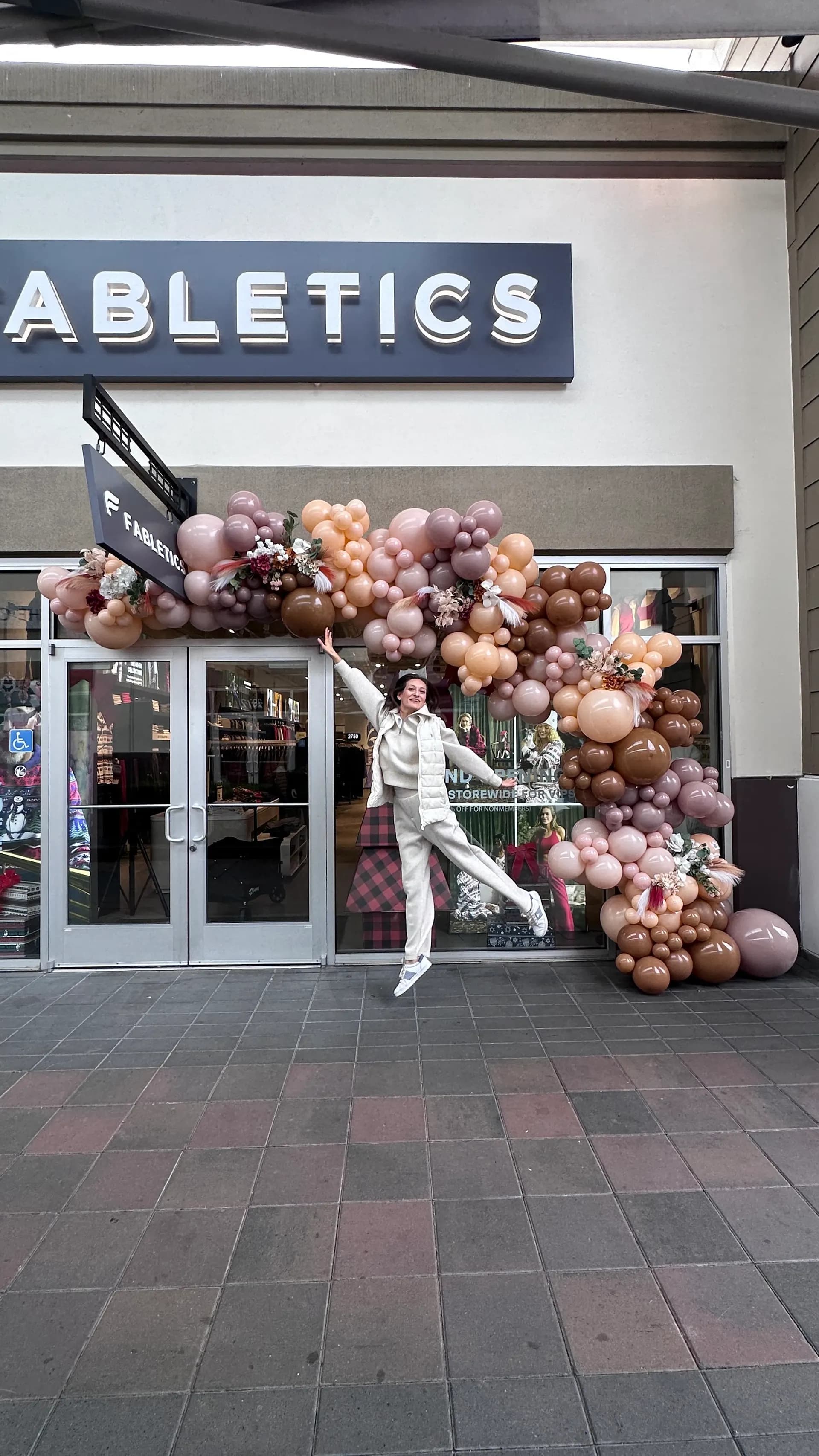 Branded storefront balloon arch produced by Balloon Décor for Fabletics in San Francisco Bay Area, view 3.