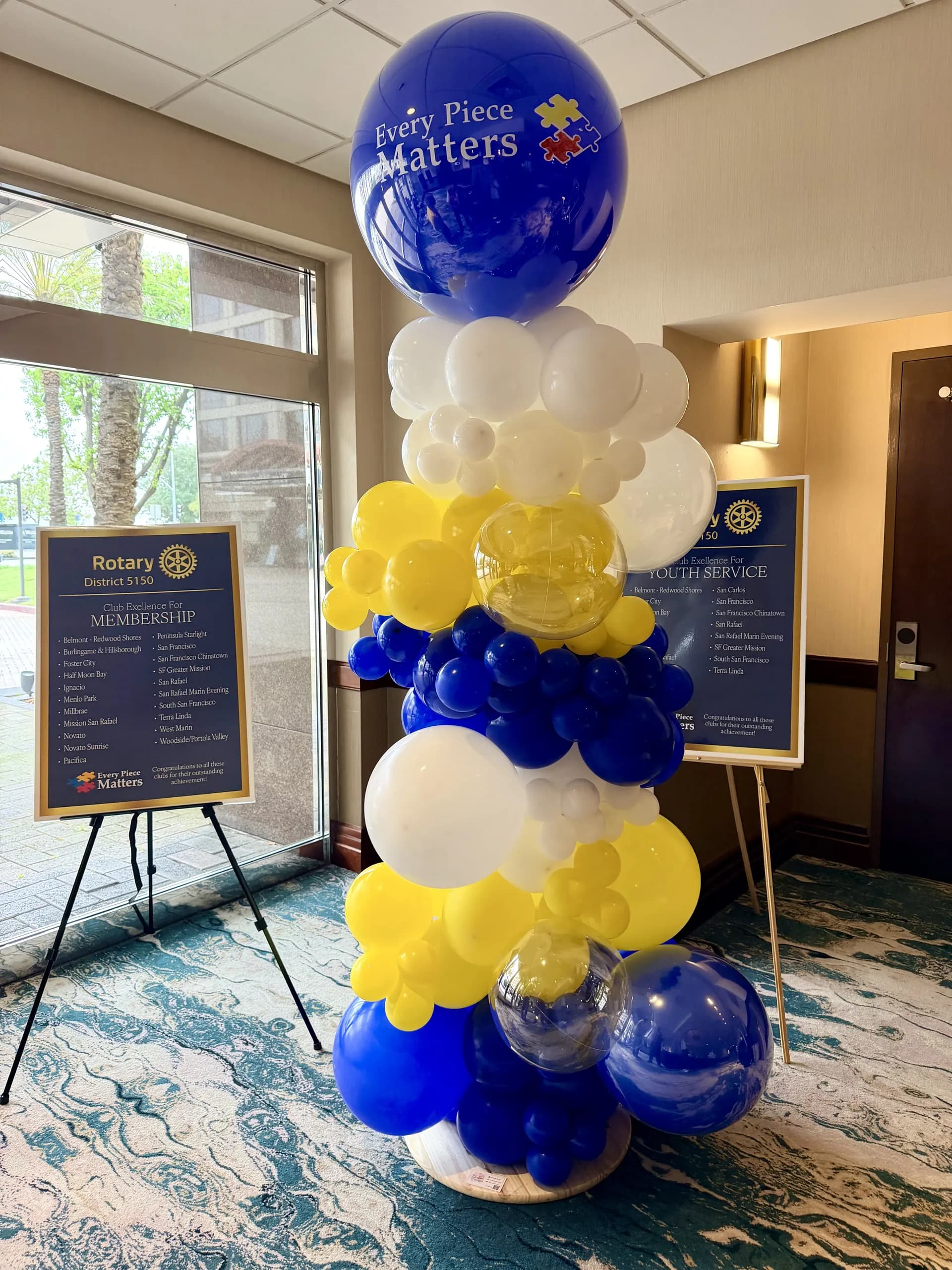 Foster City Rotary Club's Annual Meeting in Foster City, California: branded balloon columns and helium bouquets, view 2 of 7.