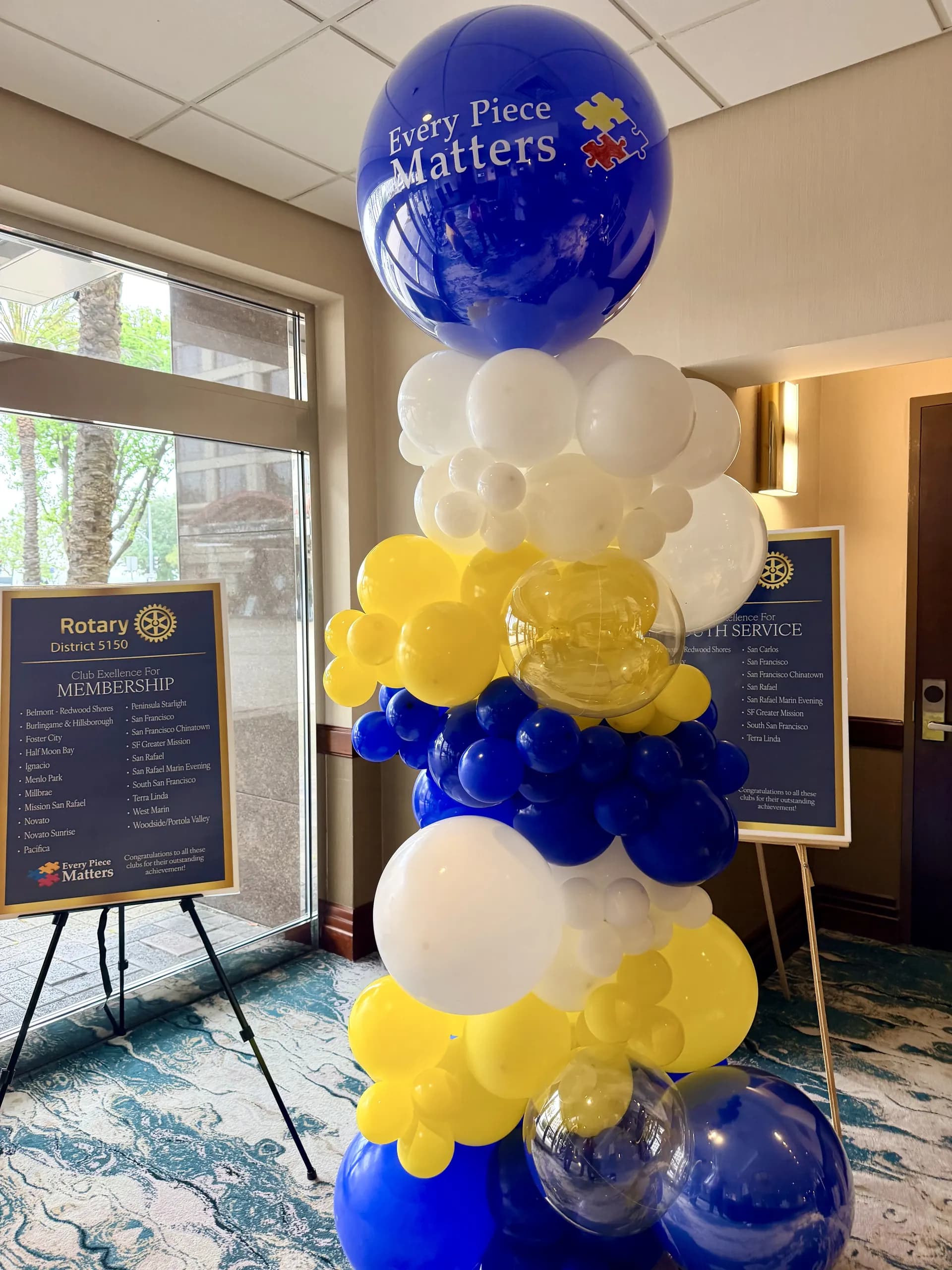 Completed branded balloon columns and helium bouquets from the Annual Meeting project in Foster City, California (image 4 of 7).