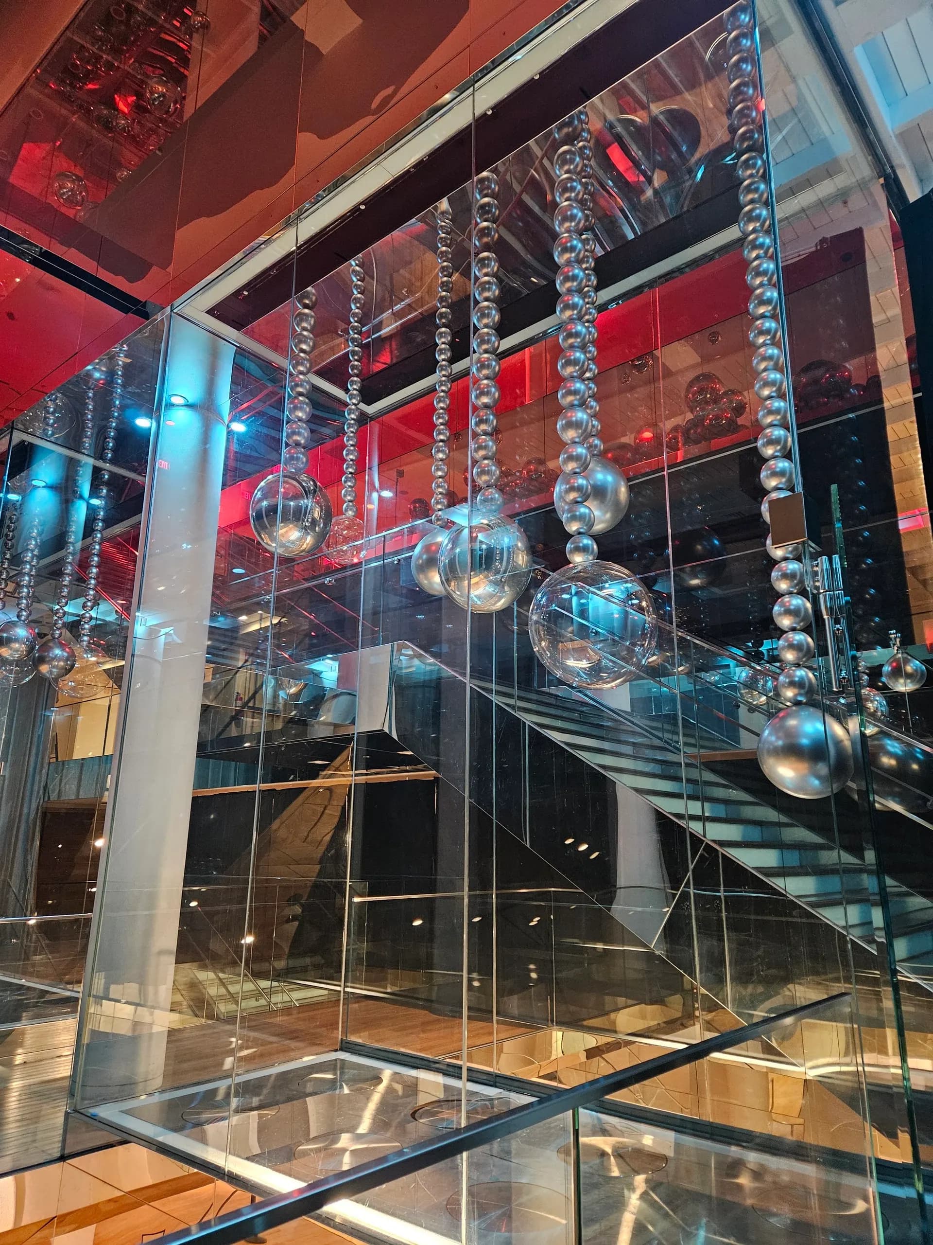 Hanging silver balloon sphere installation produced by Balloon Décor for a corporate client in San Francisco, California, view 3.