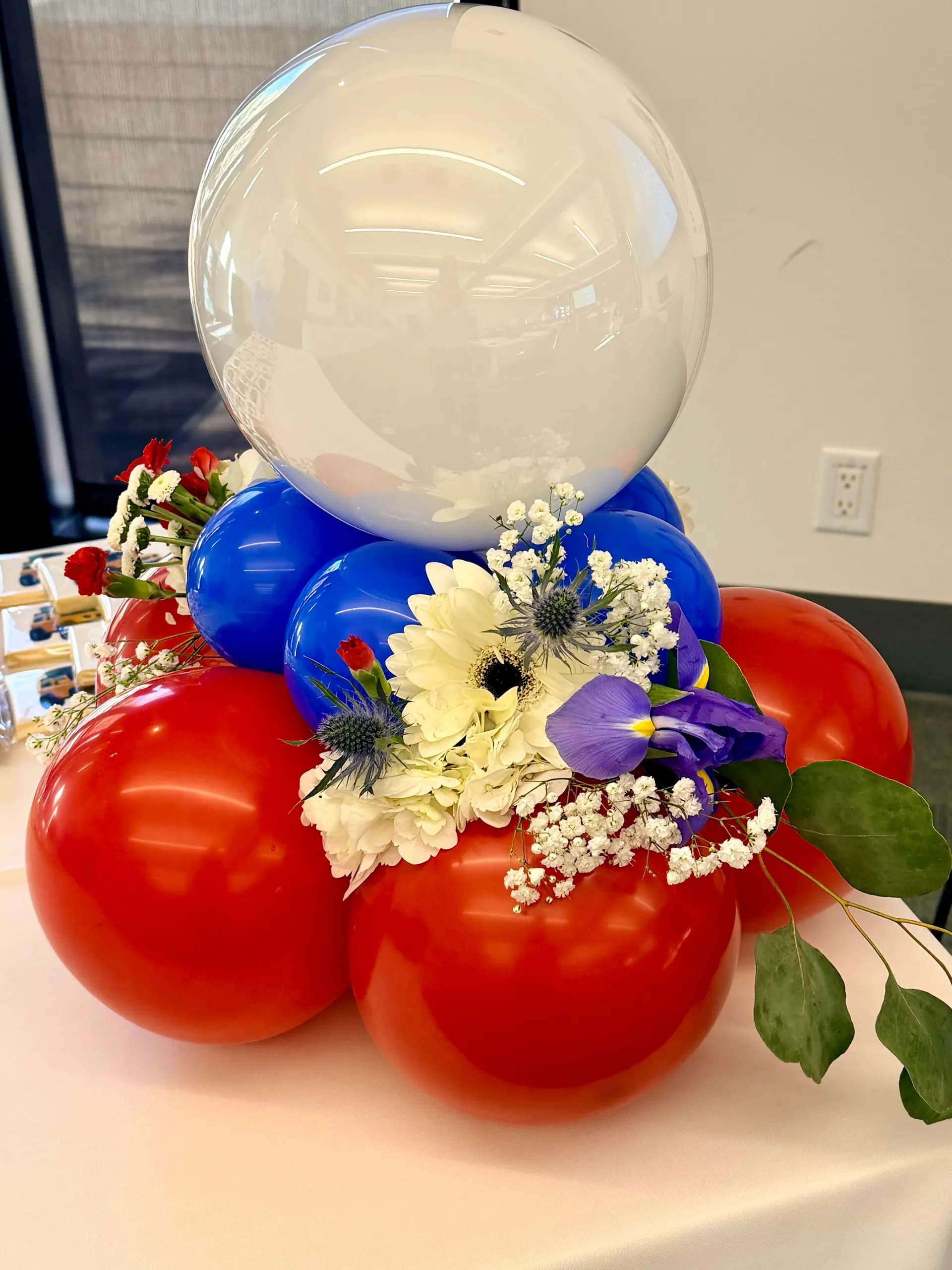 NorCal Retail Forum's Retail Industry Forum in Richmond, California: balloon arch and floral balloon centerpieces, view 2 of 5.