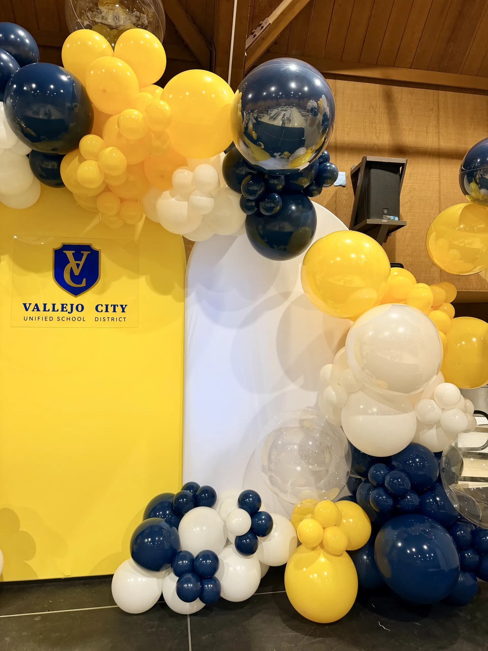 Organic balloon backdrop and career-path arch panels produced by Balloon Décor for Vallejo City Unified School District in Vallejo, California, view 3.